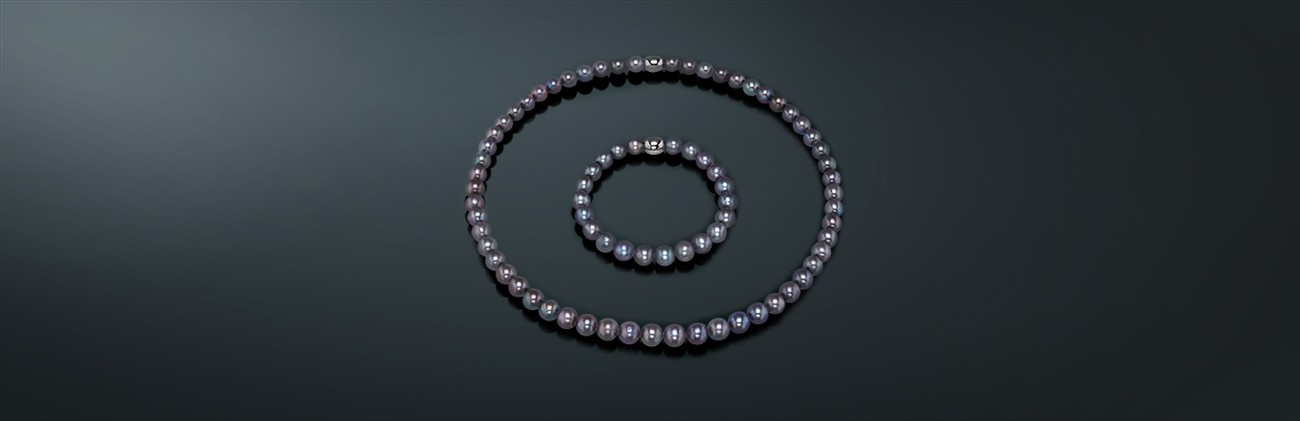 Гарнитур-трансформер из пресноводного жемчуга, ожерелье 45 см., браслет 20 см., родированное серебро 925˚ (4,70 гр.),государственное пробирное клеймо. с085-4520с